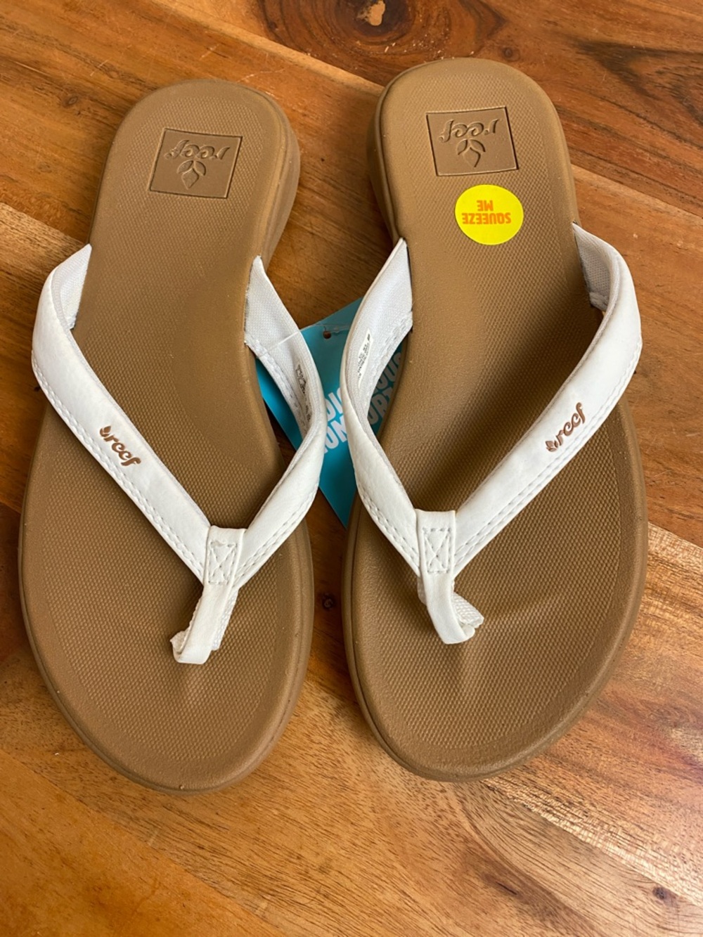 Reef Cushion Cloud Women's 5 Sandals in white and tan